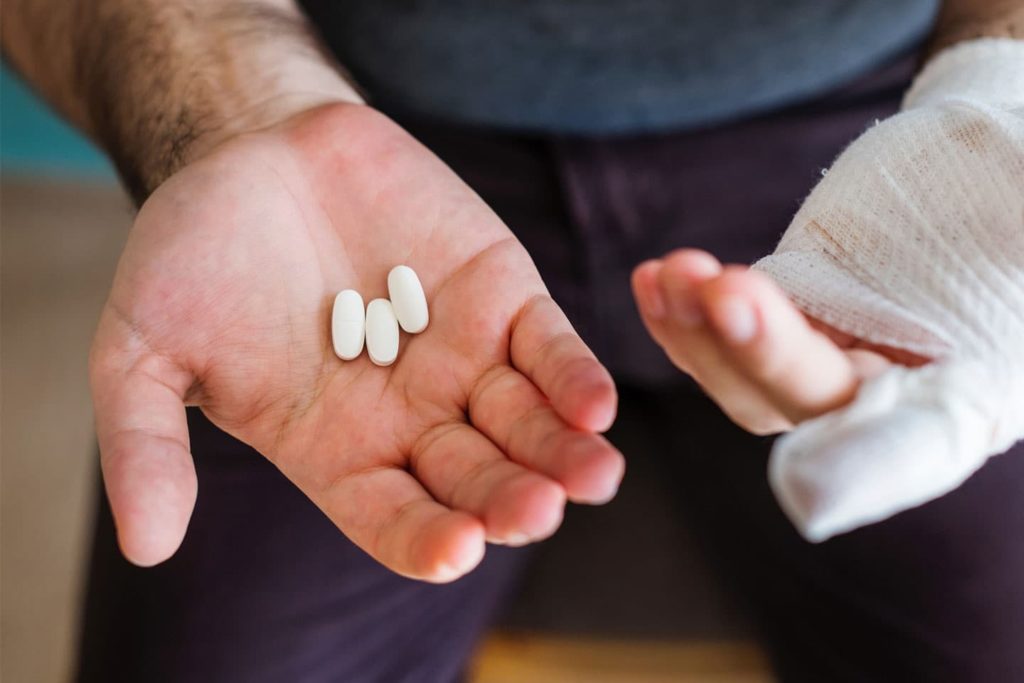person holding probiotics
