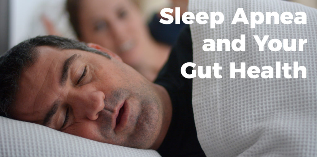 Man sleeping with text on photo "Sleep Apnea and Your Gut Health"