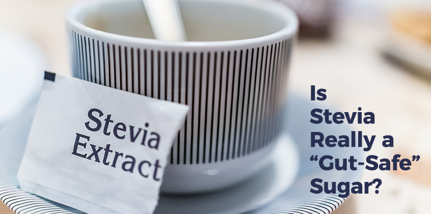 Text over coffee mug: Is Stevia Really A "Gut-Safe" Sugar?